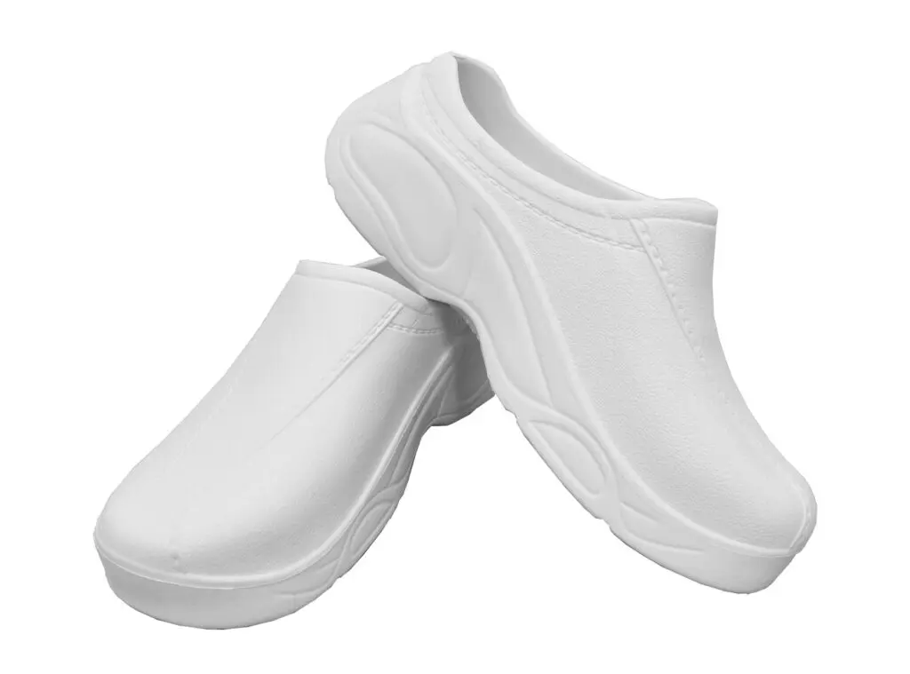 Wholesale white slip-on clogs with cushioned soles and textured uppers