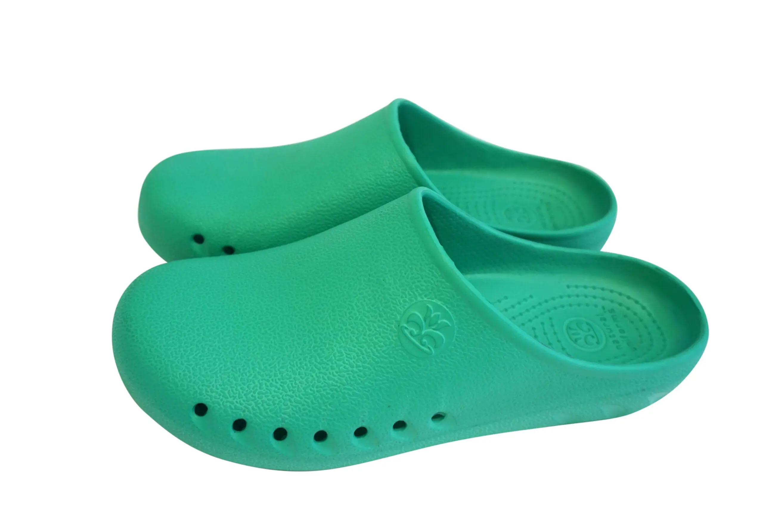 Wholesale turquoise foam clogs with ventilation holes and textured sole detail