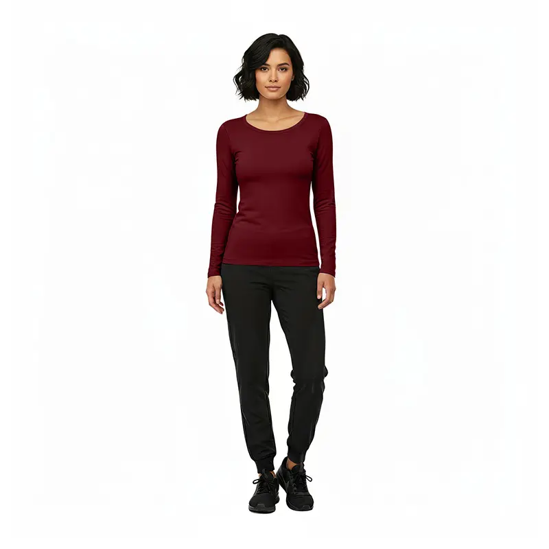 Wholesale women's burgundy long-sleeve crew neck top with black jogger pants and black lace-up shoes