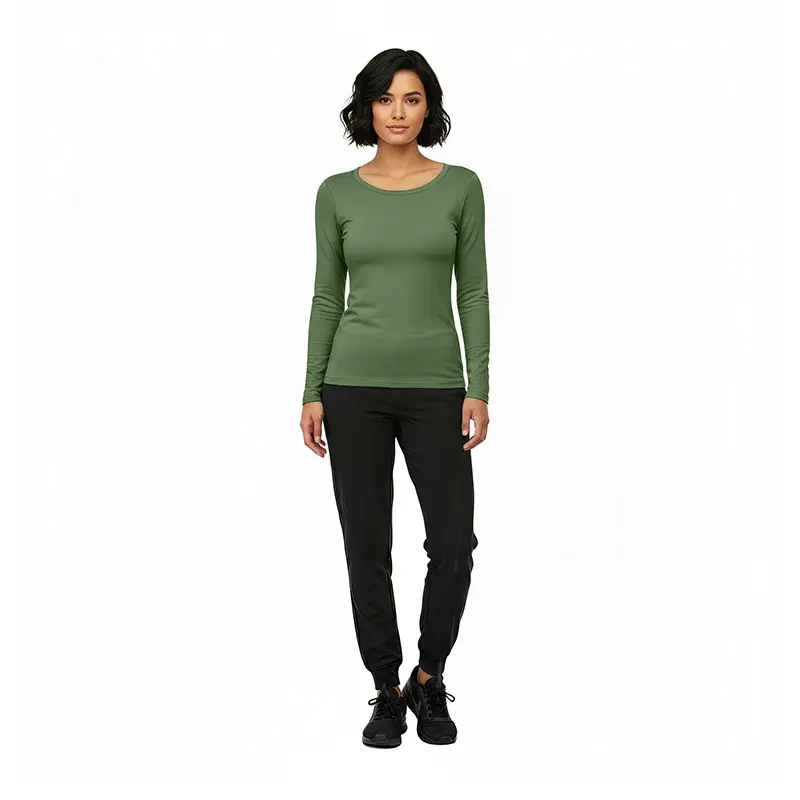 Wholesale women's long-sleeve green crew neck top paired with black jogger pants and black lace-up shoes