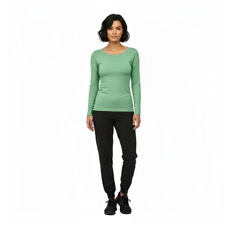 Wholesale women's sage green long sleeve fitted t-shirt with black jogger pants and black lace-up sneakers