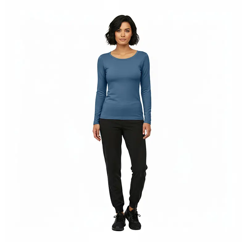 Wholesale women's blue long-sleeve crew neck top with black jogger pants and black lace-up shoes