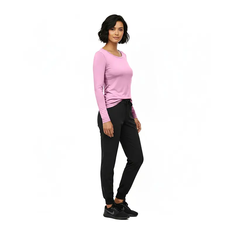 Wholesale women's pink long-sleeve top with black jogger pants and black sneakers
