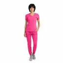 Wholesale women's hot pink v-neck scrub top and jogger pants set with small logo detail