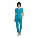 Wholesale women's teal v-neck scrub top with matching jogger pants and gray sneakers