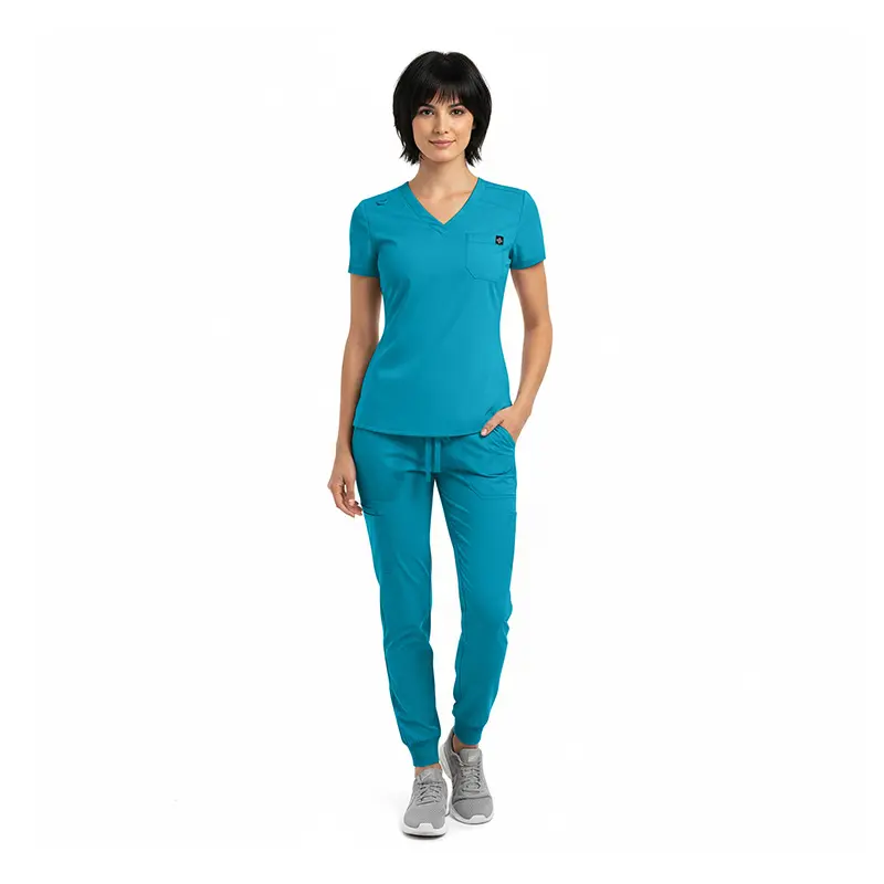 Wholesale women's teal v-neck scrub top with matching jogger pants and gray sneakers