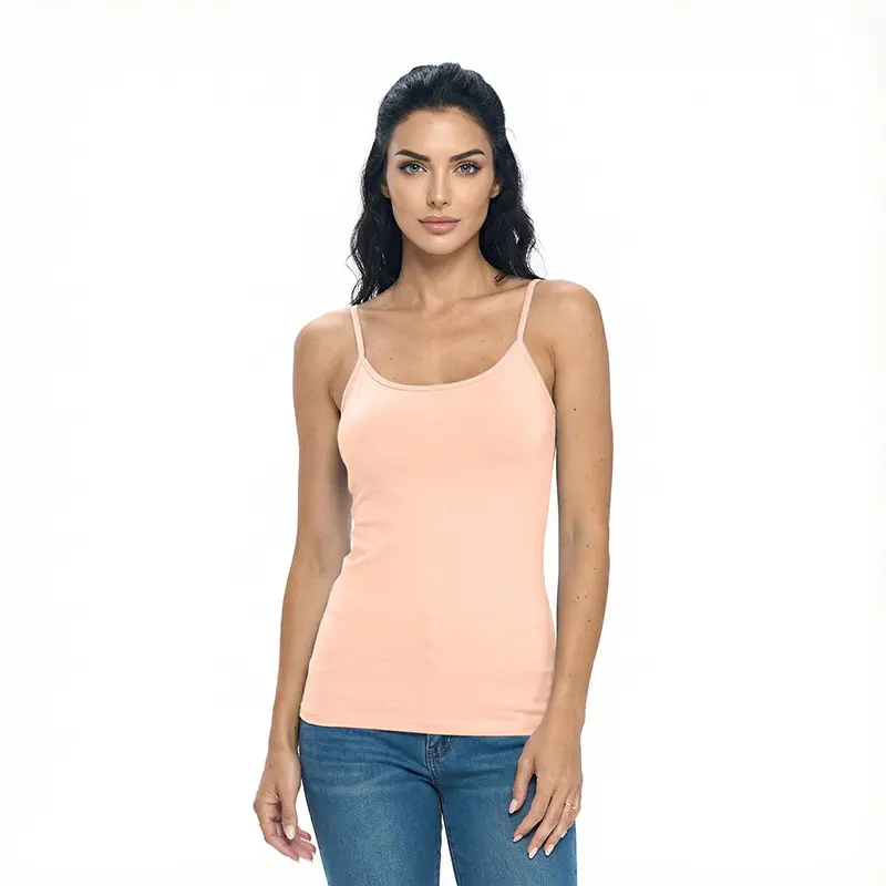 Wholesale women's peach camisole tank top with thin straps paired with blue jeans