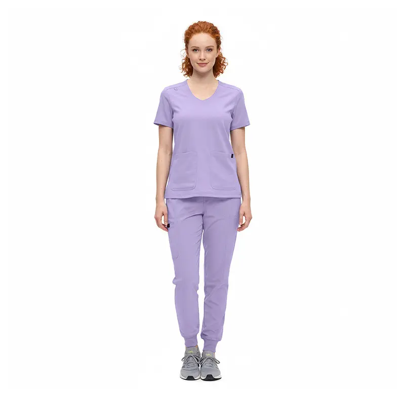 Wholesale women's lavender v-neck scrub top and jogger pants set with pockets