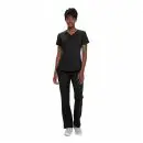 Wholesale women's black v-neck scrub top with short sleeves and matching black pants with white sneakers