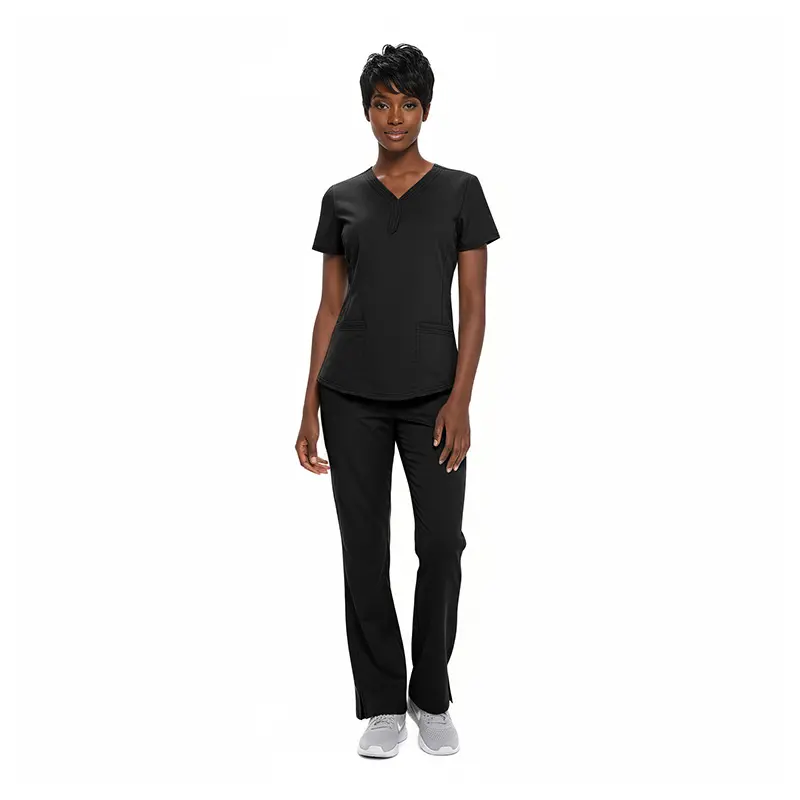Wholesale women's black v-neck scrub top with short sleeves and matching black pants with white sneakers