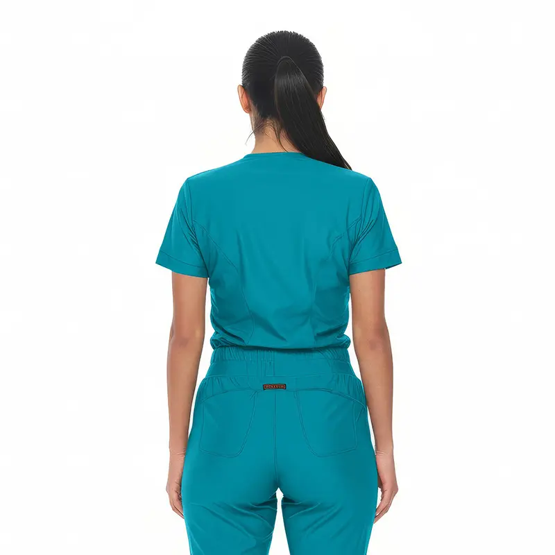 Wholesale women's teal scrub set with short-sleeve top and pants featuring pockets