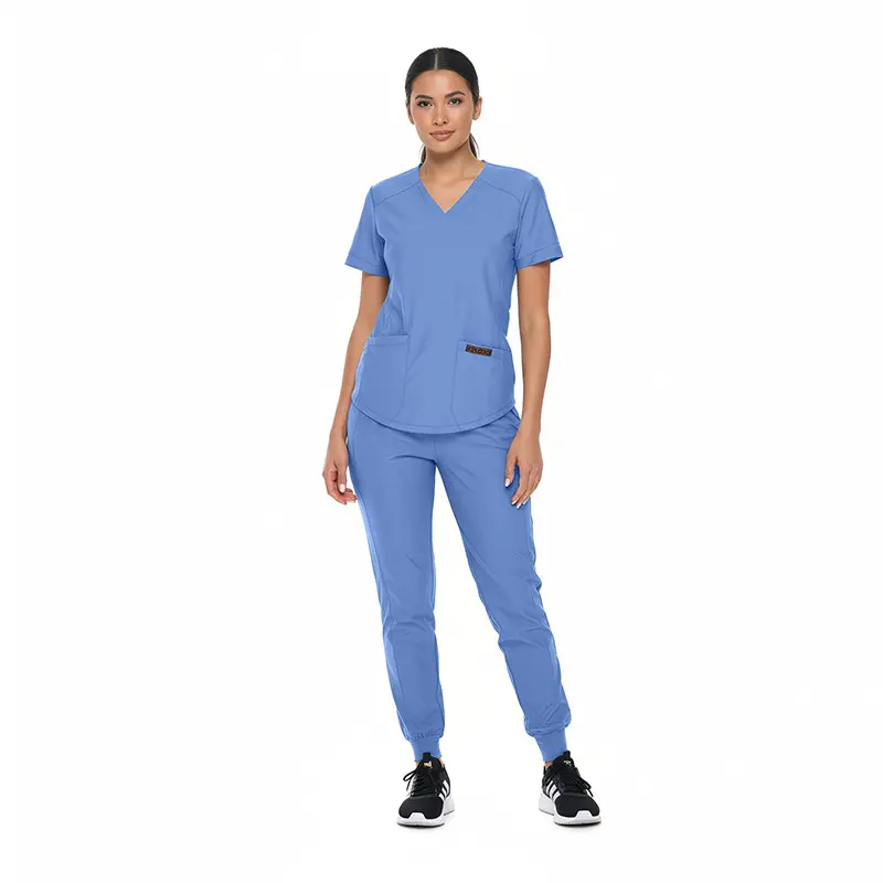 Wholesale women's blue v-neck scrub top and jogger pants set with short sleeves and front pocket detail