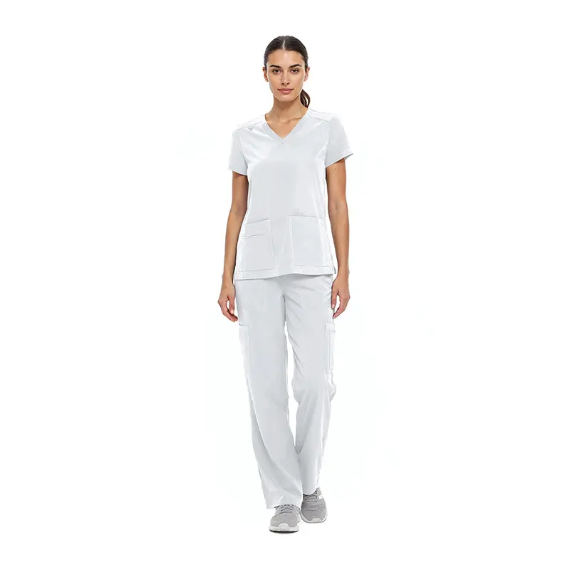 Wholesale women's white v-neck scrub top with short sleeves and front pockets paired with white cargo pants