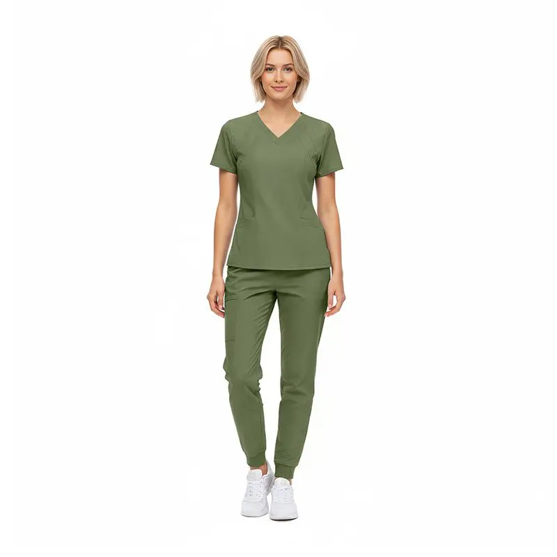 Wholesale women's sage green v-neck scrub top and jogger pants set with white sneakers