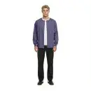 Wholesale men's purple button-up cardigan with white trim, worn over white t-shirt and black pants