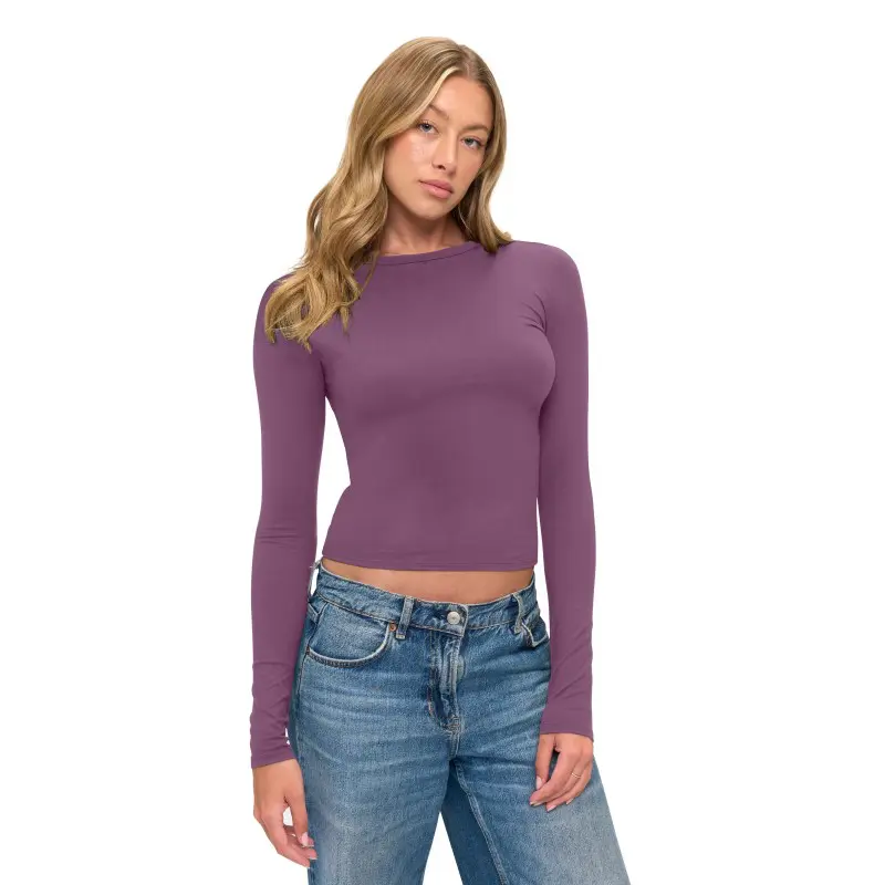 Wholesale women's purple long sleeve cropped t-shirt with blue jeans
