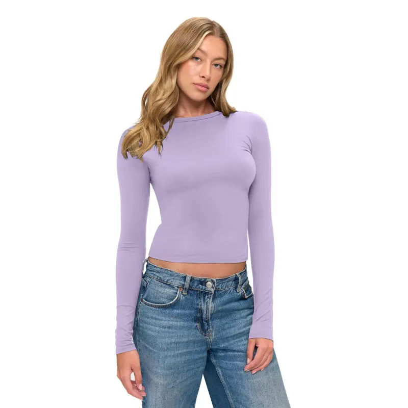 Wholesale women's lavender long sleeve fitted crop top paired with blue jeans