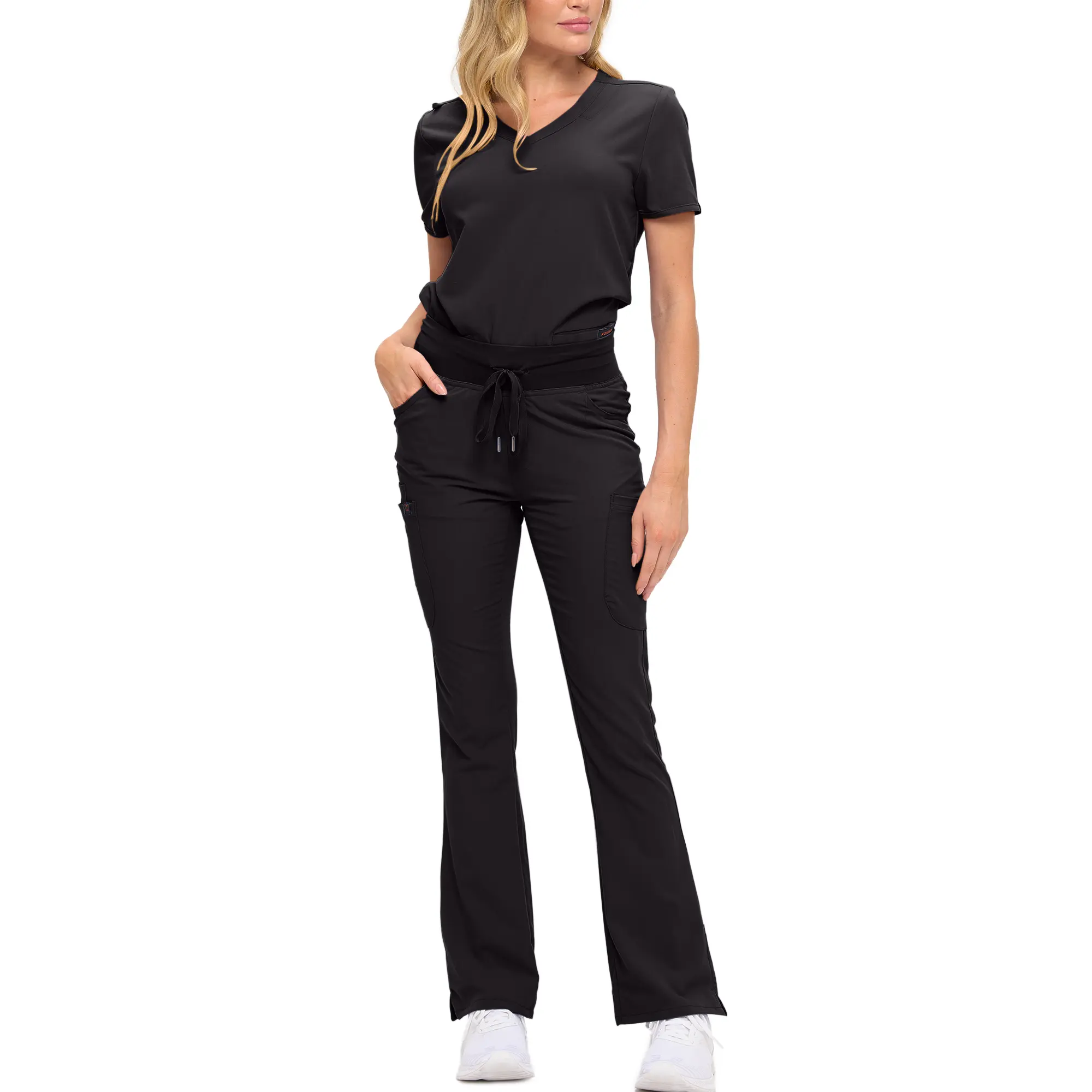 Wholesale women's black v-neck scrub top with matching drawstring pants and white sneakers