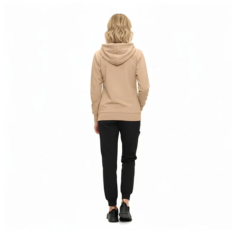 Wholesale women's beige hoodie with black jogger pants and black sneakers, back view