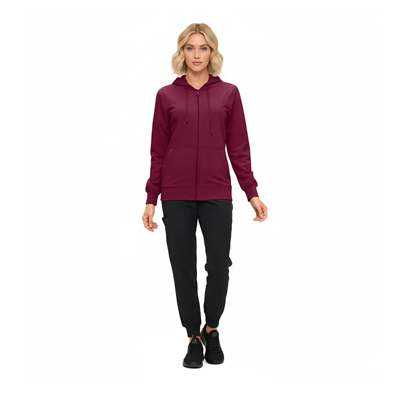 Wholesale women's burgundy zip-up hoodie with black jogger pants and black sneakers