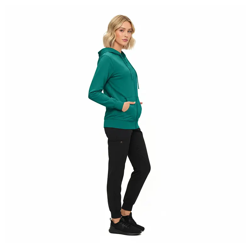 Wholesale women's teal zip-up hoodie with black jogger pants and black sneakers