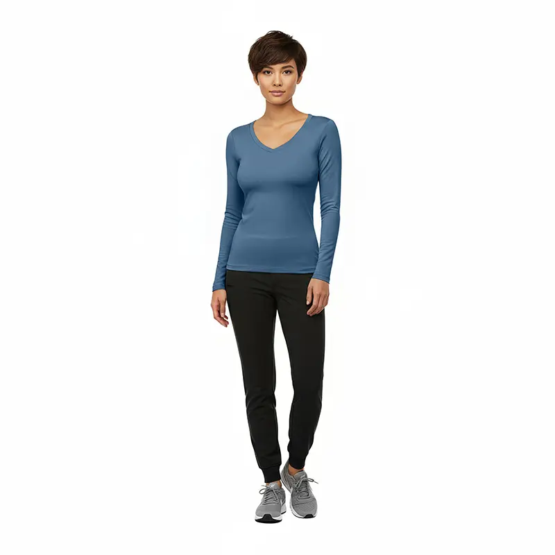 Wholesale women's blue long-sleeve v-neck top with black jogger pants and gray sneakers