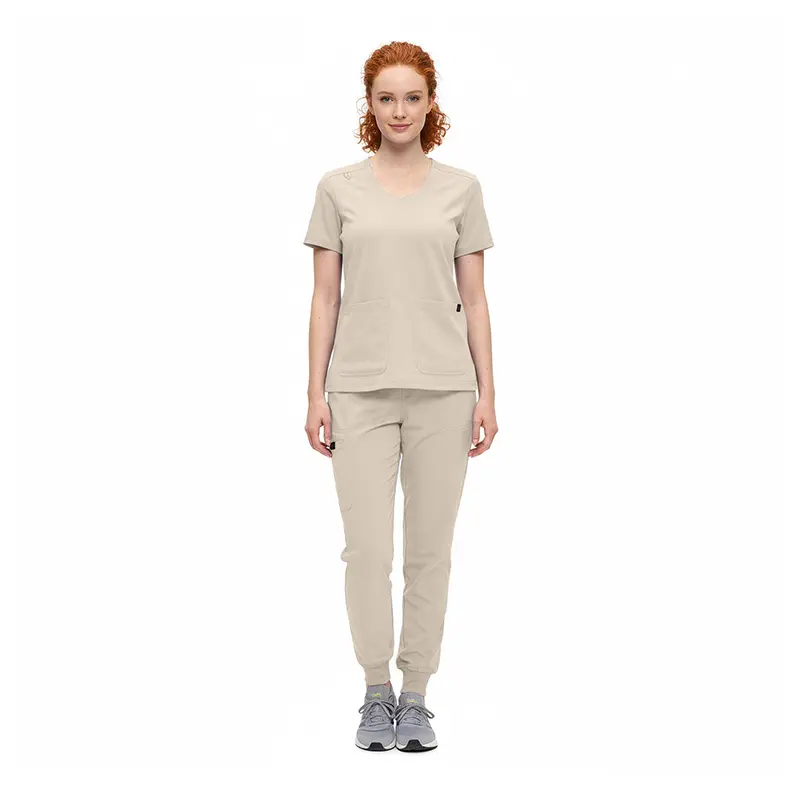 Wholesale women's beige v-neck scrub top and jogger pants set with front pockets