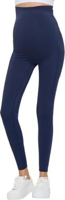 Wholesale navy blue high-waisted leggings with ankle length and stretchy fabric, styled with white sneakers