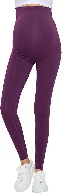 Wholesale women's maternity leggings in purple with high waistband, shown with white sneakers