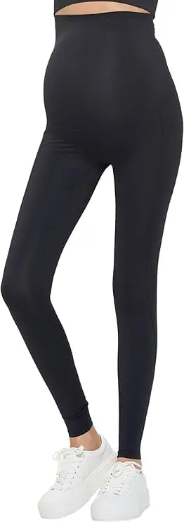 Wholesale women's high-waisted black leggings with white sneakers