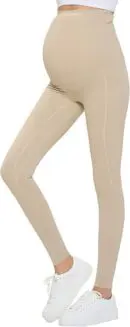Wholesale beige maternity leggings with high waistband and ankle cuffs worn with white sneakers